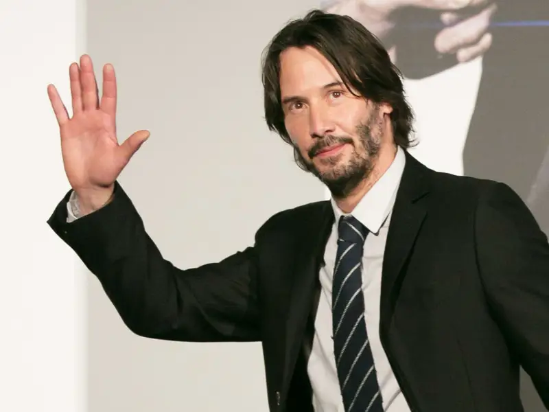 keanu reeves waving